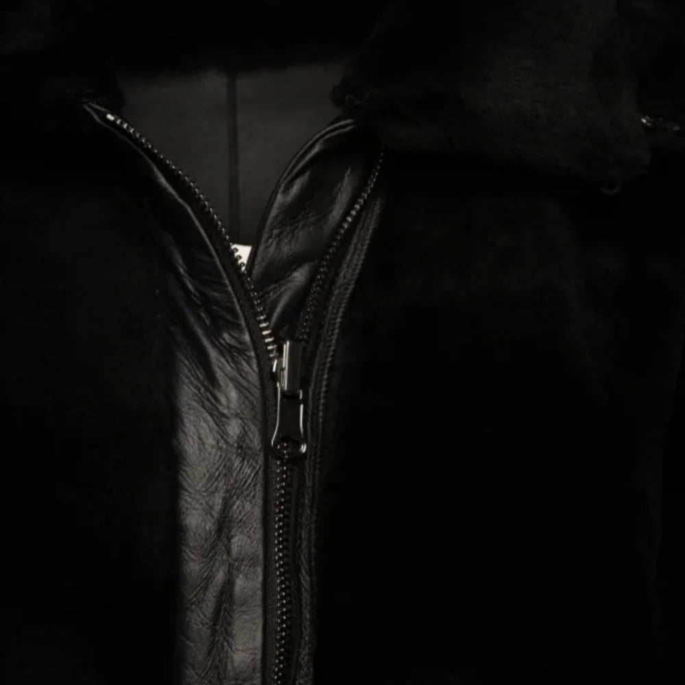 Zipper Close-up of the Avalon Black oversized reversible sheepskin long coat, featuring high-quality stitching, a plush collar