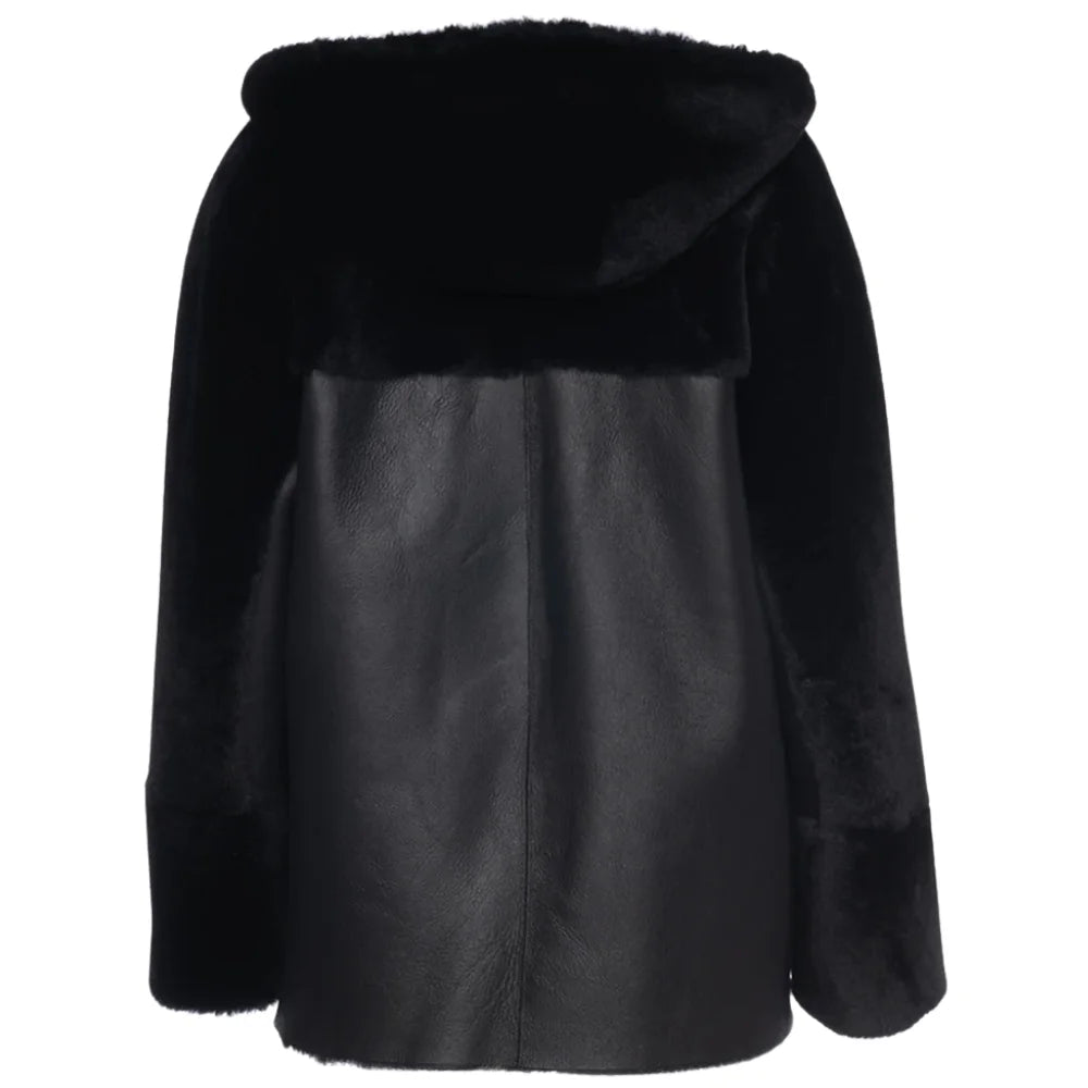 Back view of the Elena reversible shearling jacket featuring a relaxed, boxy fit and visible seam detailing.