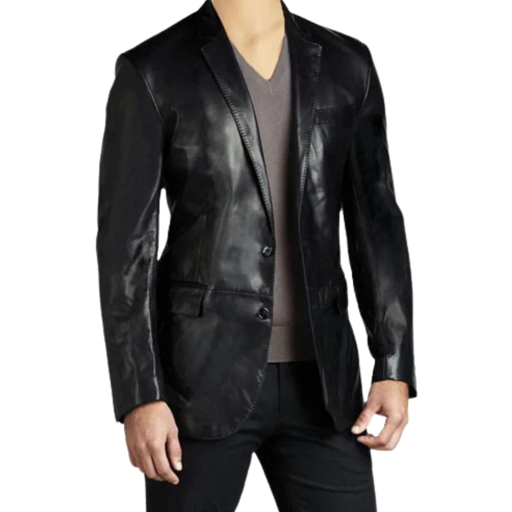 Man wearing an oversized black leather blazer, styled with a casual outfit