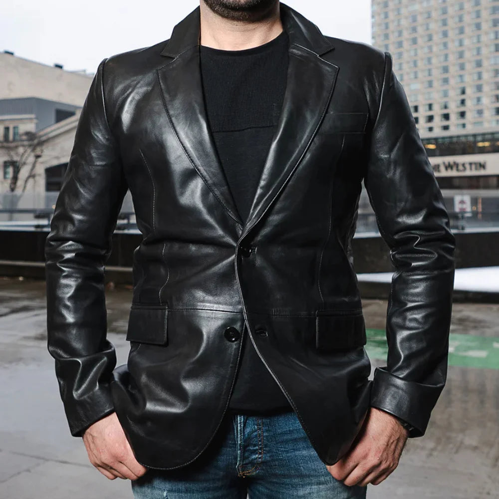 Close-up of the high-quality stitching and button details on the oversized black leather blazer, emphasizing craftsmanship.