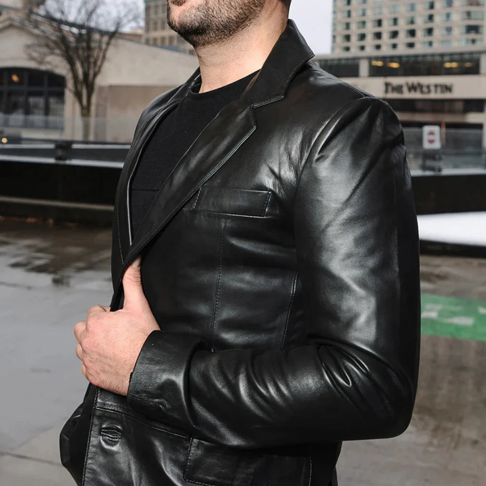 Side view of the oversized black leather blazer, showcasing its modern fit and premium leather material.
