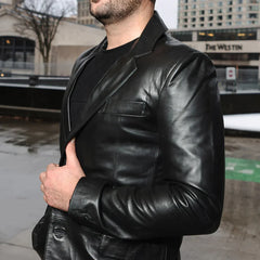 Side view of the oversized black leather blazer, showcasing its modern fit and premium leather material.