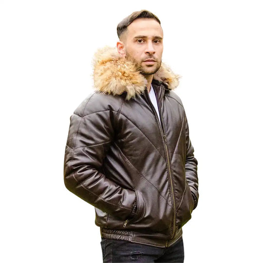 Close-up of the dark brown ribbed knit cuffs and waistband, designed to lock in heat and maintain the bomber shape.