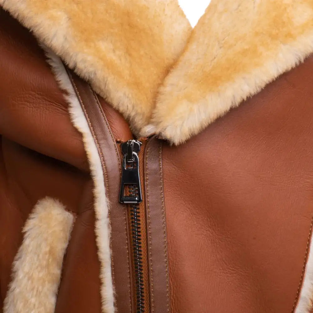 Asymmetrical Zippered and shearling lapel front detail of Alek's Biker Shearling Jacket, designed for a customizable fit and added style.