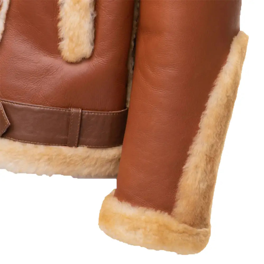 Detailed view of fur trimmed cuffs of aleks biker jacket 