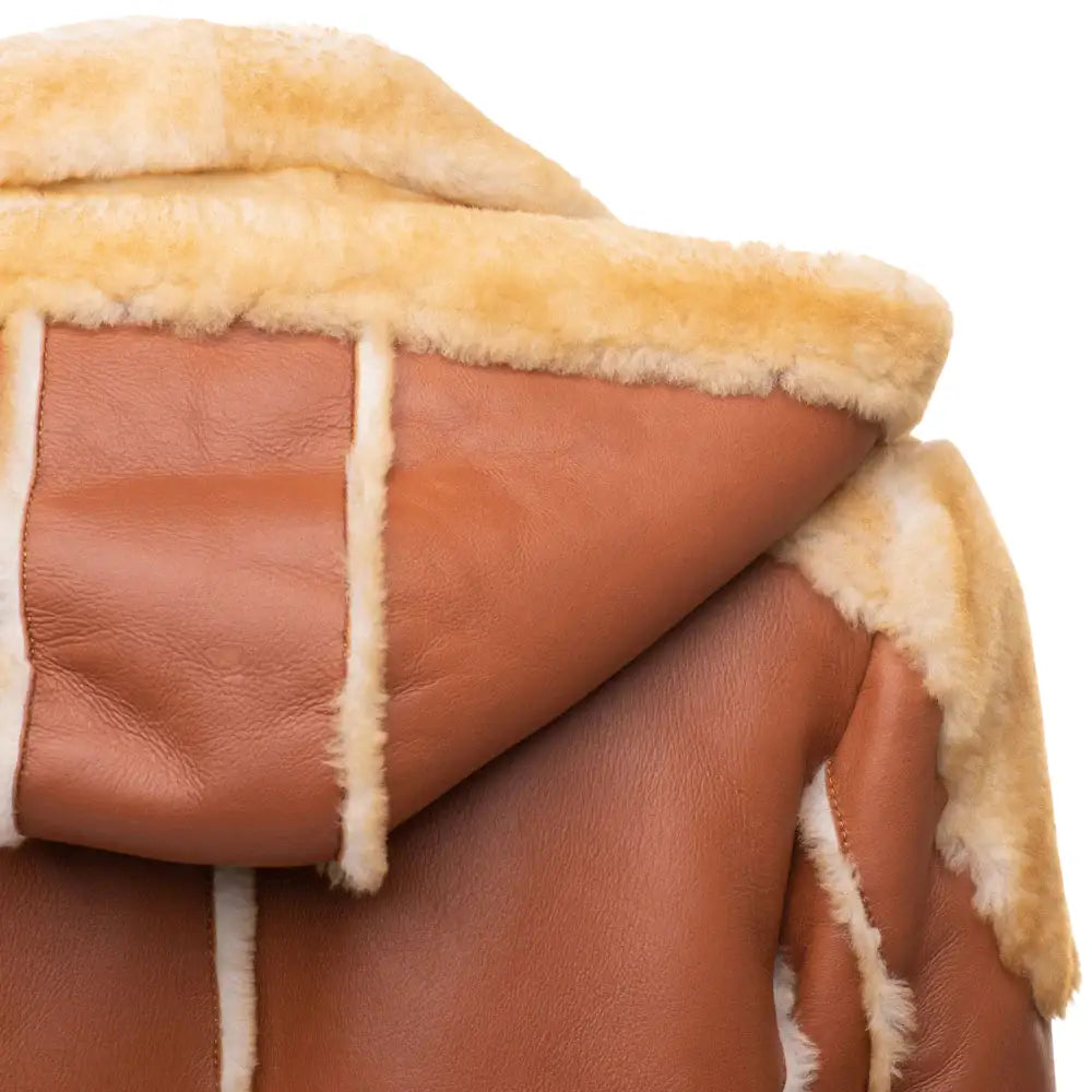 Back view of hooded shearling jacket with fur collar detailing 