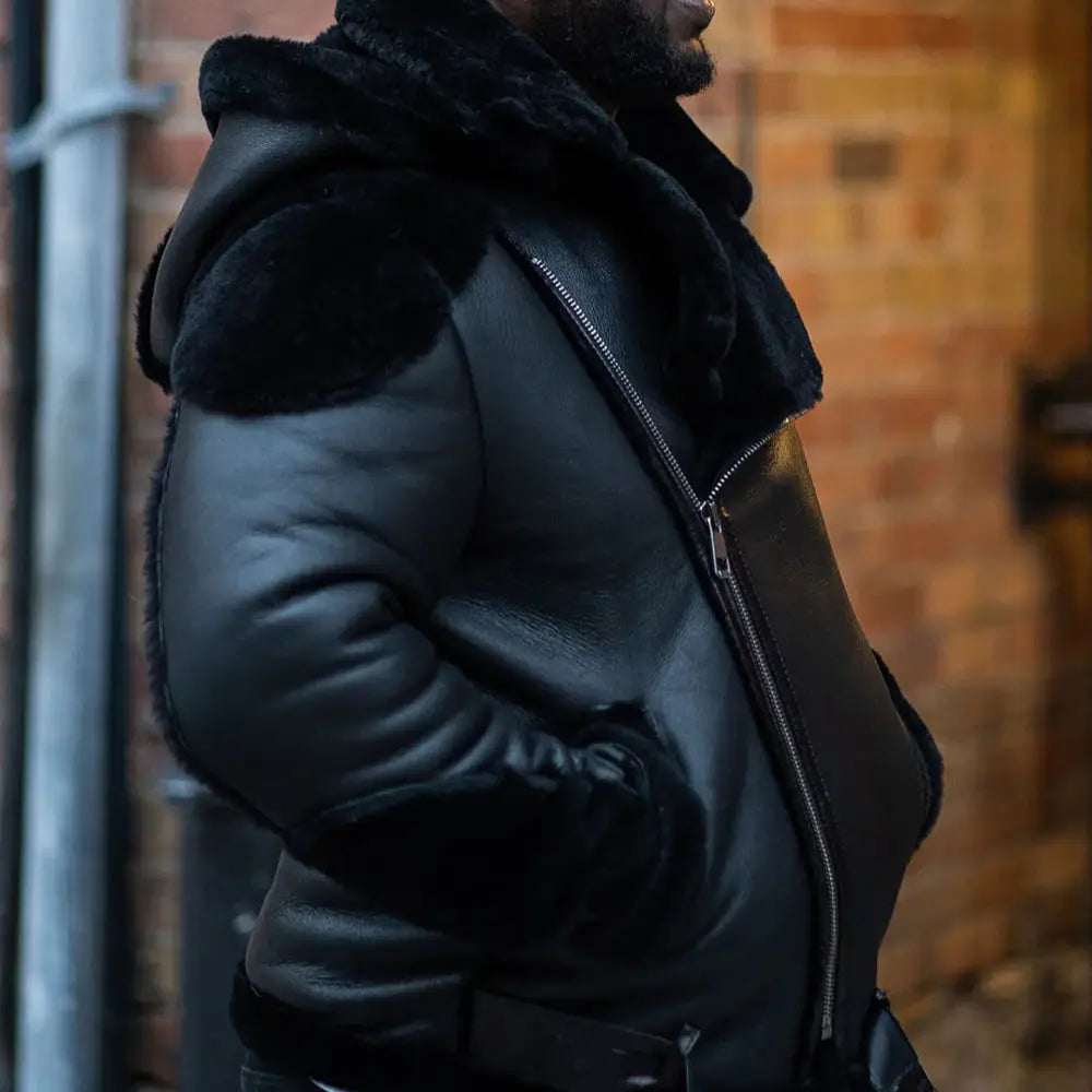 Model side view wearing Alek's Black Shearling Leather Biker Jacket black shearling biker jacket profile