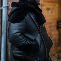 Model side view wearing Alek's Black Shearling Leather Biker Jacket black shearling biker jacket profile
