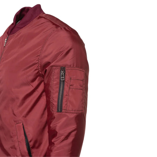 Close-up of zippered sleeve utility pocket on a maroon flight jacket, white background.