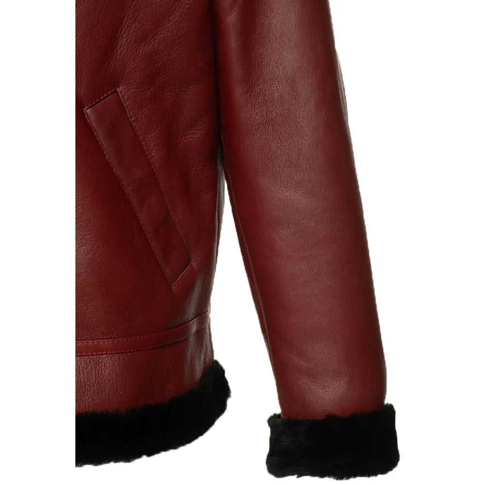 Close-up of the jacket sleeve and black fur cuff on the Aurelius Burgundy B3 Bomber Leather Jacket with white background.