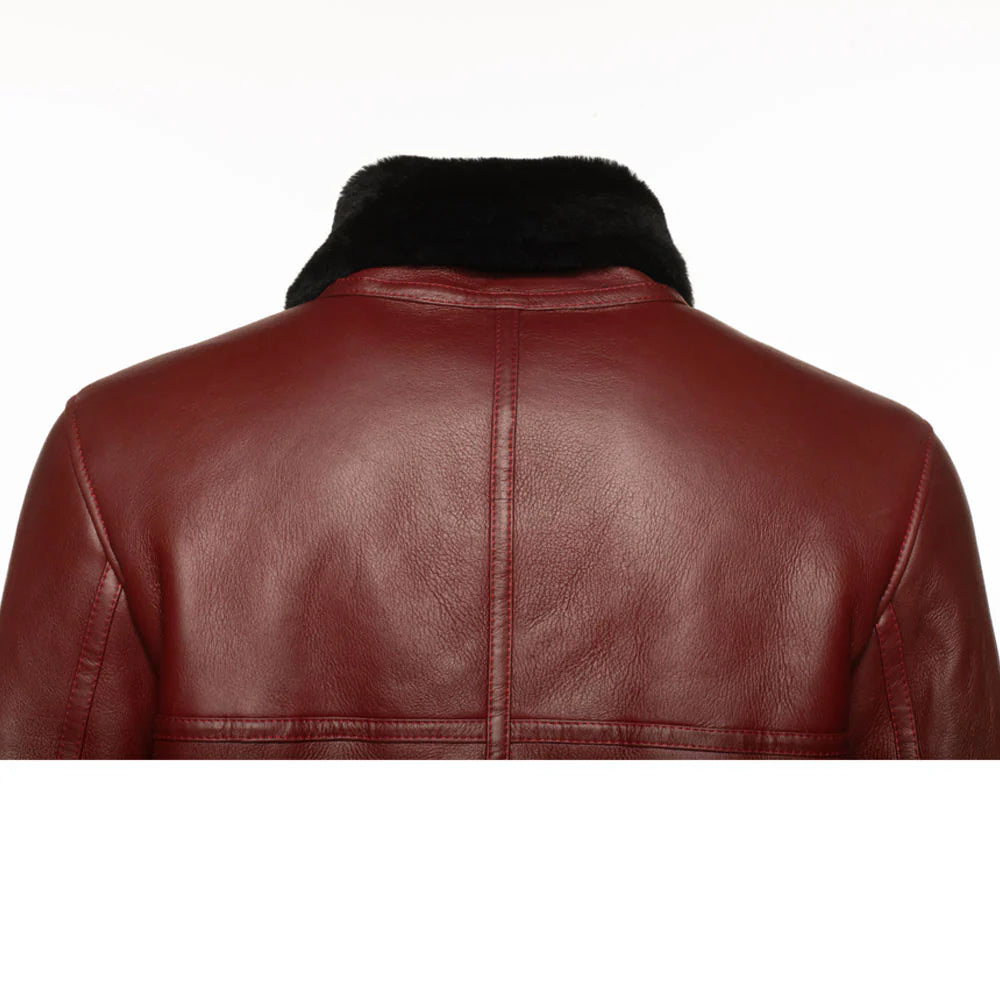 Close-up of the back shoulder paneling and premium leather grain on the Aurelius Burgundy B3 Bomber on a white background.