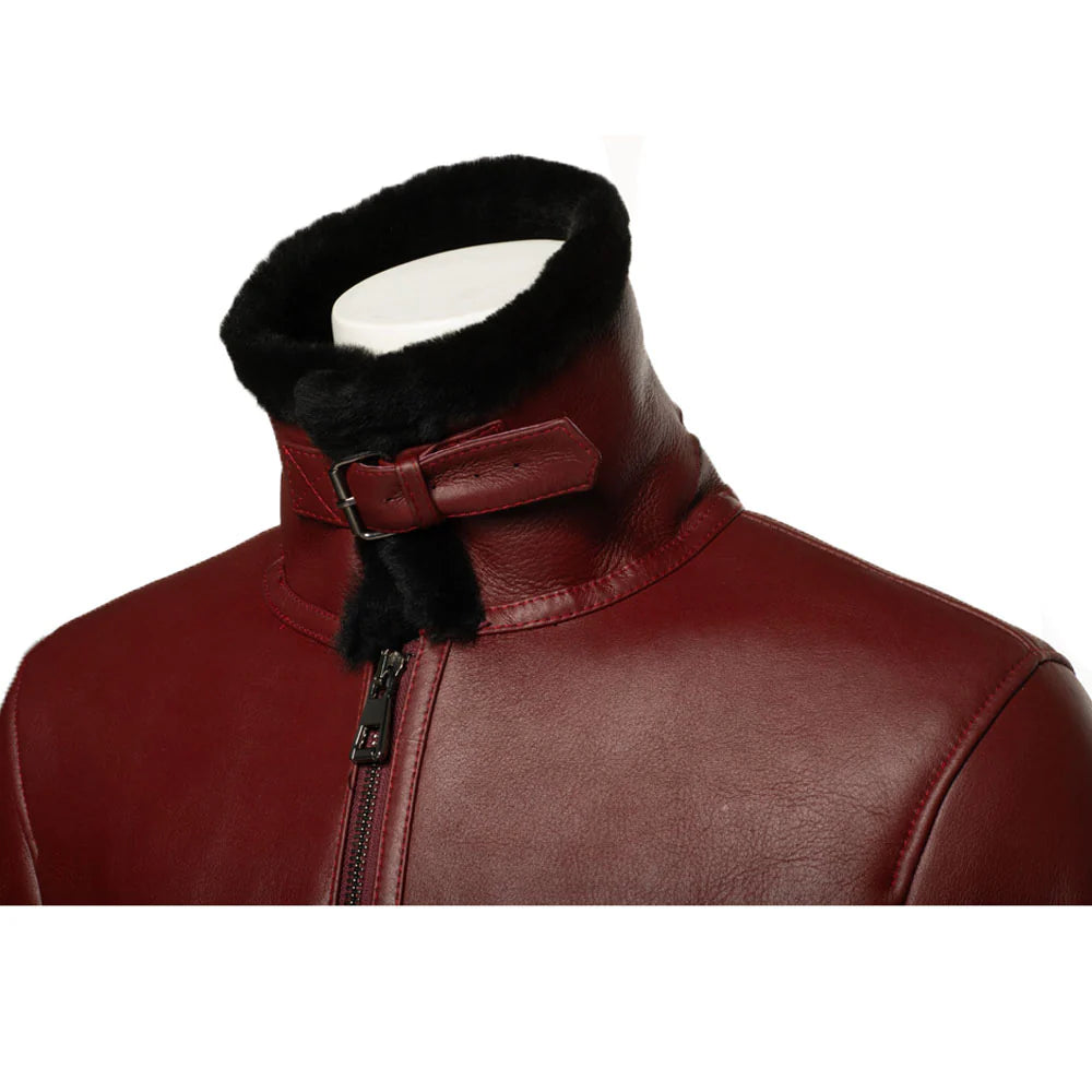 Close-up of the buckled high collar on the Aurelius Burgundy B3 Bomber Jacket featuring plush black shearling lining on a white background.