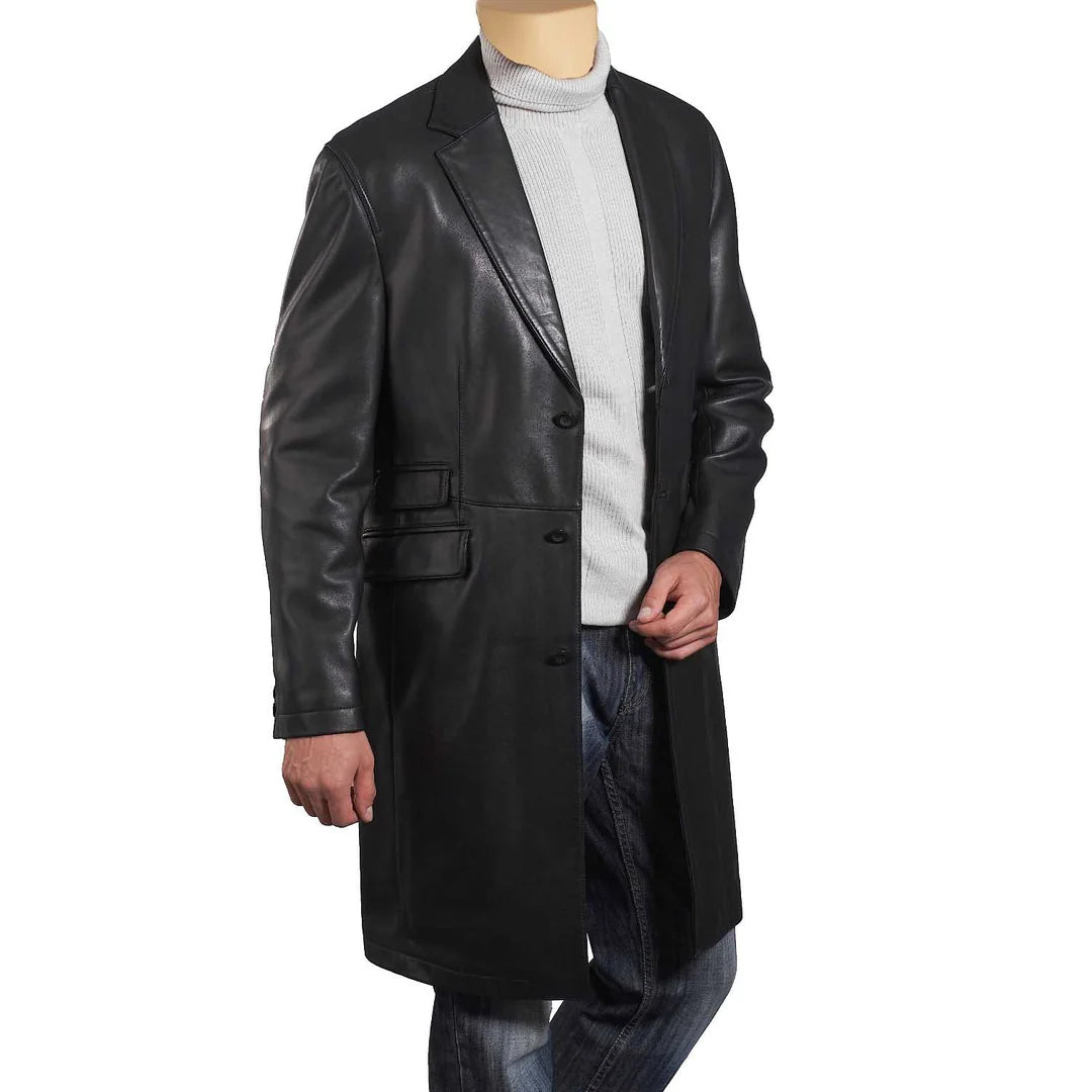 Front view of a black leather 3/4 length trench coat on a mannequin, featuring a button-down front and classic collar.