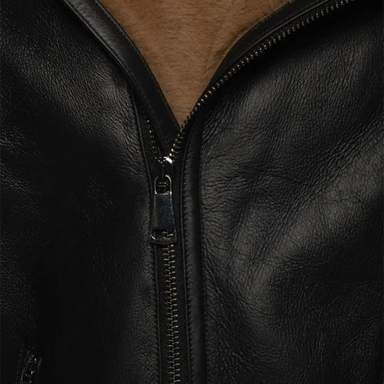 Close-up of the zipper detailing on the Carters biker shearling jacket with cream shearling accents.
