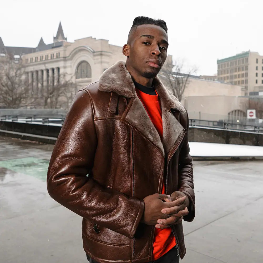 Model wearing Carters Mateo brown leather biker jacket with shearling