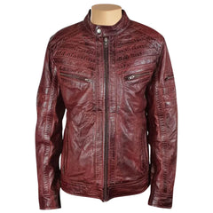 Front view of Charley Ellwood’s moto style burnished burgundy leather jacket with a quilted shoulder design on a white background.