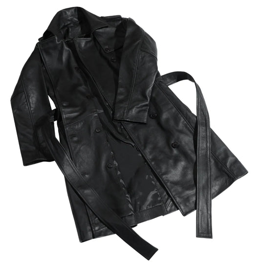 Full view of the coral black leather coat, highlighting the high-quality tonal lining and interior pocket.