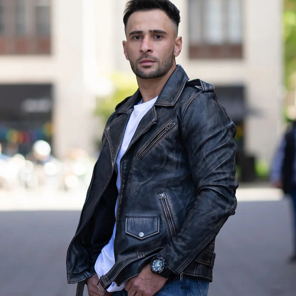 Model wearing the distressed belted leather biker jacket, styled with casual clothing for a bold, biker-inspired appearance.