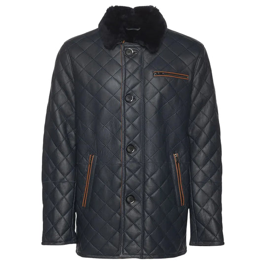 A navy quilted sheepskin shearling coat with a shirt style fur collar, buttoned up closure, and two functional outer pockets.