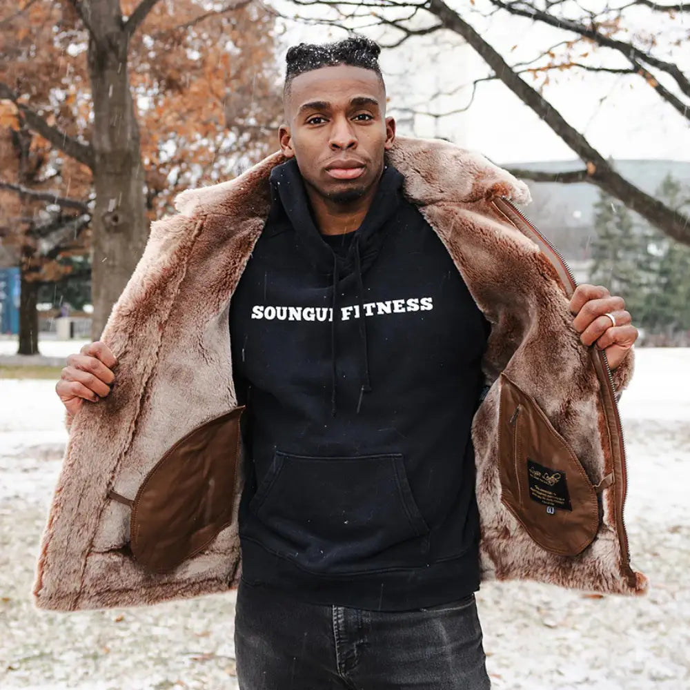 Model wearing Felix Brown Bomber Jacket with Hoodie brown hooded leather jacket