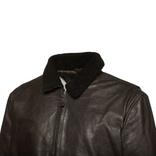 Side profile view of the Havana brown G1 Bomber leather jacket, highlighting the smooth leather texture and well-tailored fit.