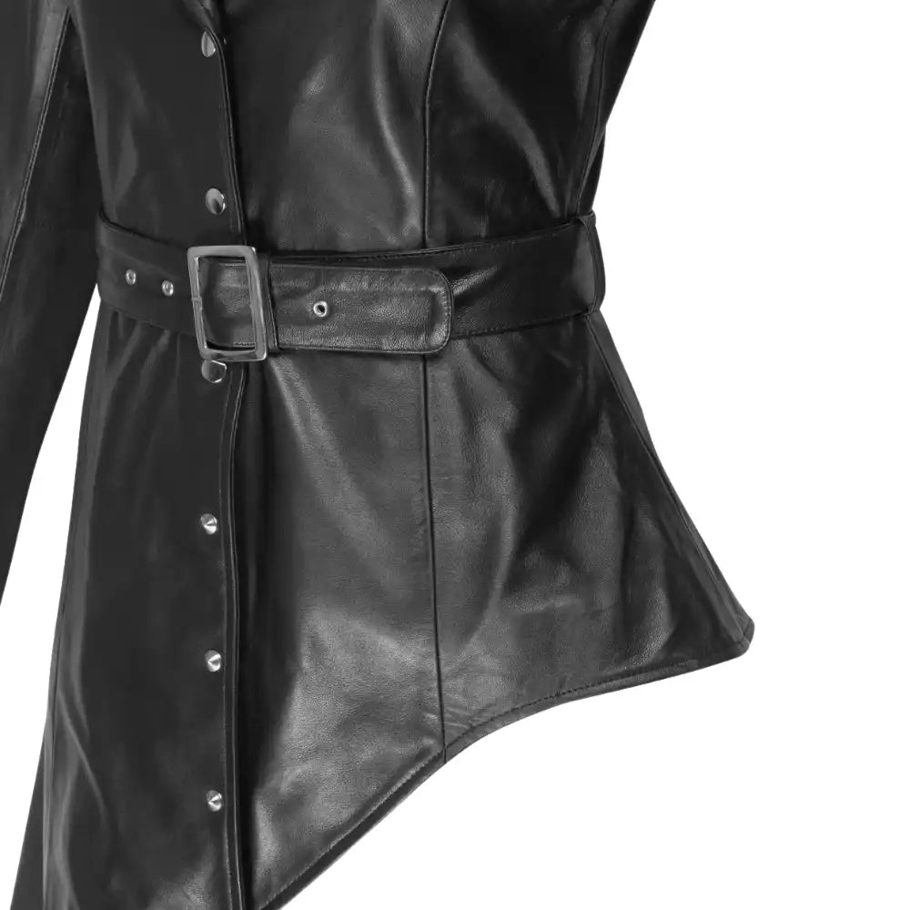 Close-up of the a belt and button details of the Jennifer asymmetrical dress on a white background.