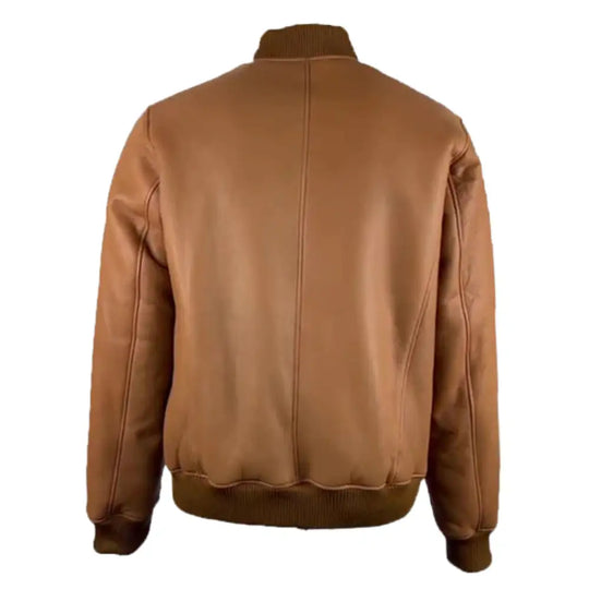 Back view of the Jonathan Tan shearling bomber jacket, showing the clean leather design with a ribbed waistband.