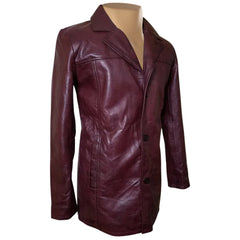 Side profile of Krueger's maroon leather blazer highlighting the slim-cut sleeves, structured shoulders, and the depth of the flap pockets.