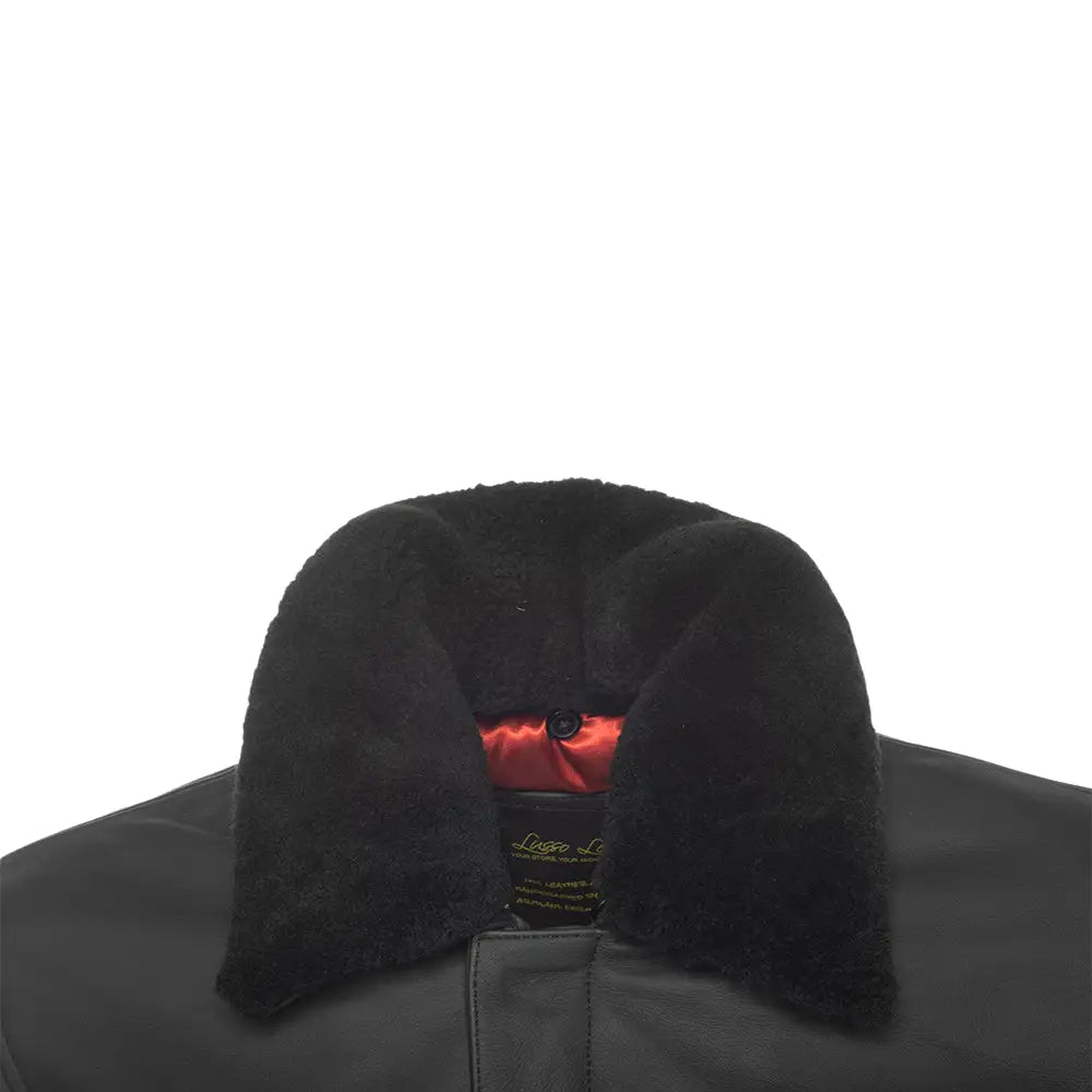 Close-up of the shirt collar of a matte black A2 bomber leather jacket.