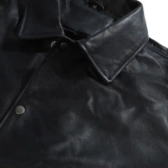 Ryder Black Varsity Style Leather Jacket close up leather texture on varsity jacket