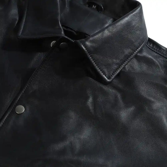 Ryder Black Varsity Style Leather Jacket close up leather texture on varsity jacket