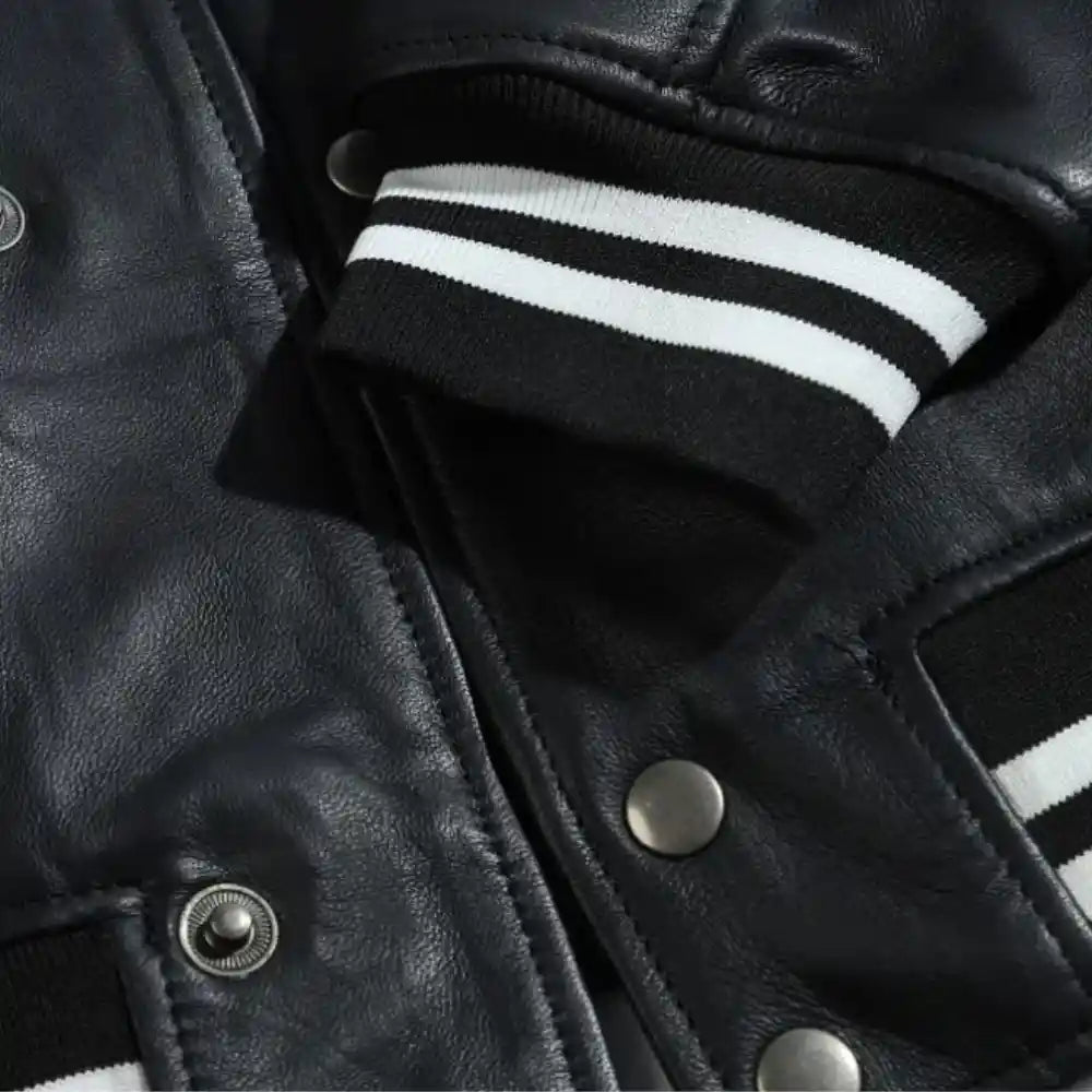 Ryder Black Varsity Style Leather Jacket close up sleeve leather texture