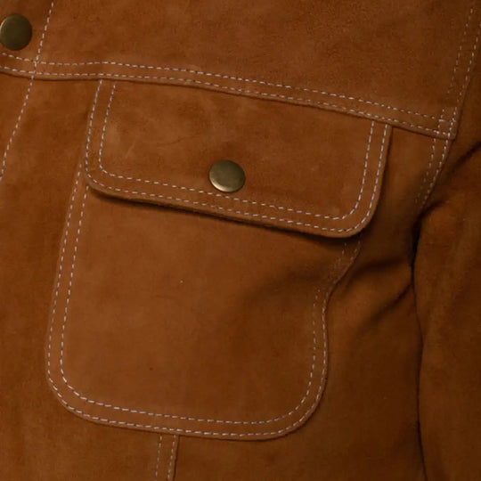 Close-up of a tan suede leather jacket with buttoned pocket