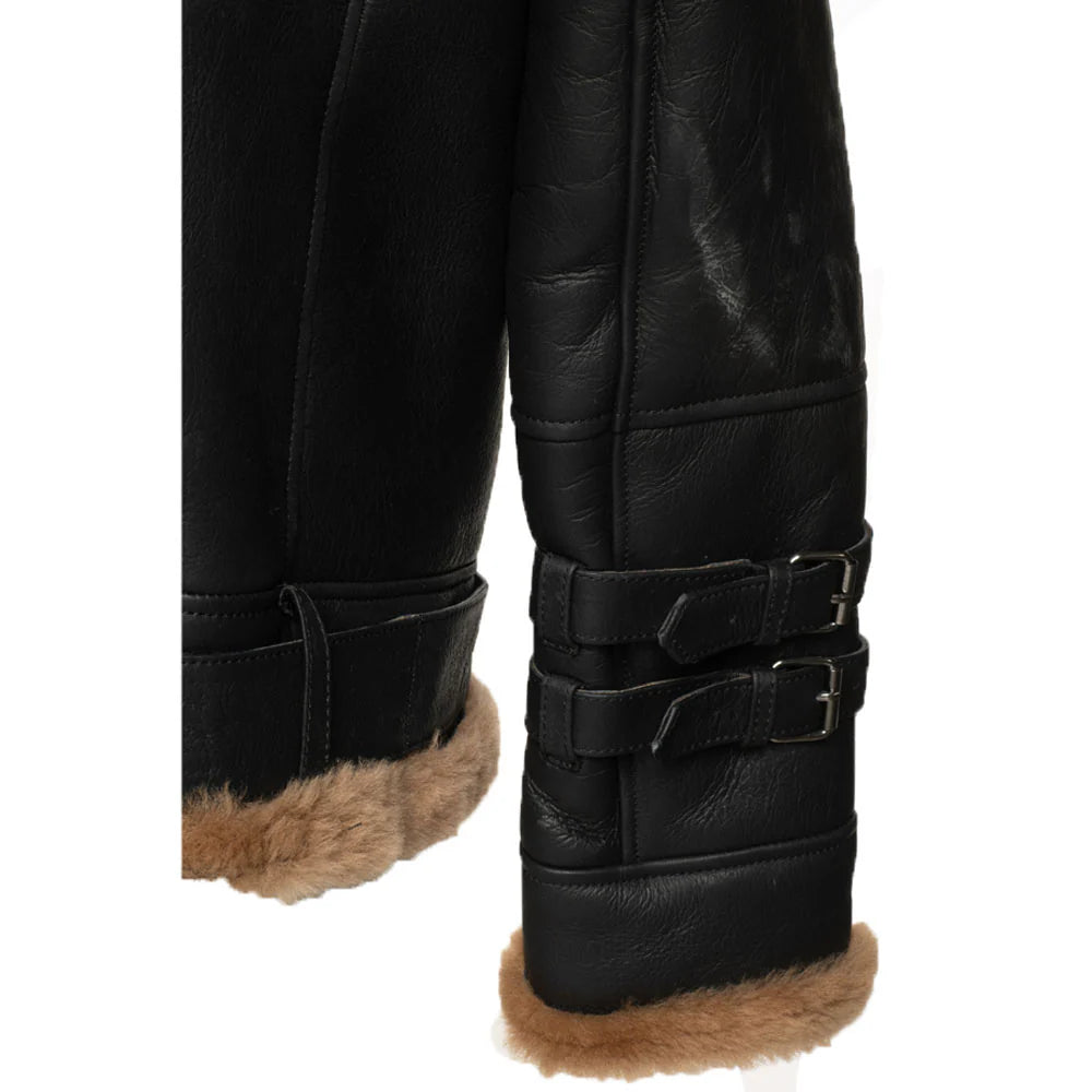 Close-up of the shearling cuffs with belted setting and waistband on Viktor's black leather aviator bomber jacket.