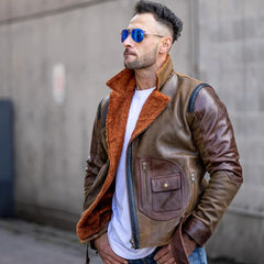 Model wearing Vintage Brown Sherpa D-Pocket Leather Biker Jacket styled with casual denim.