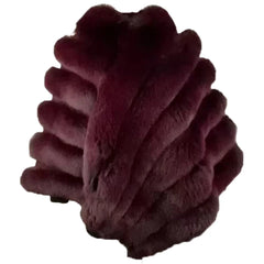 A front full-length view of a luxurious women's burgundy fox fur cape featuring a voluminous fur collar and a symmetrical poncho-style silhouette on a white background.