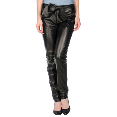 Sofa and Stylish Leather pants with a leather belt