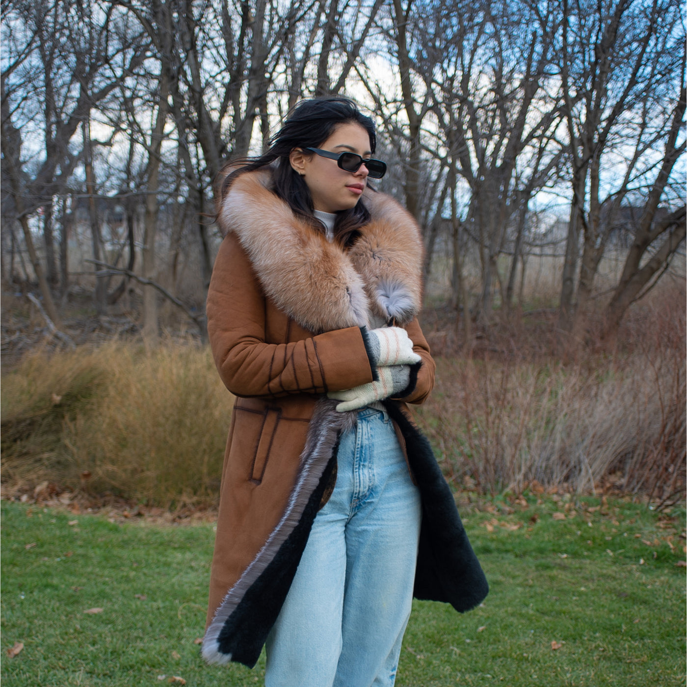 Chantal's Tan Shearling coat with large fox fur hoodie and trim